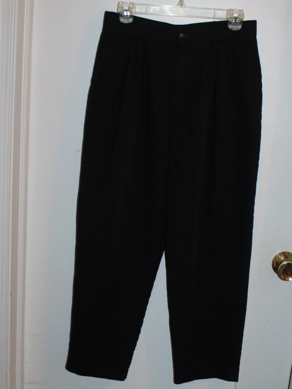 A pair of Classic black pleated pants Size 14